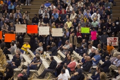 Student protestors file into the isles of Neal Fieldhouse while keynote speaker, Vernon A. Wall, lectures. The protestors held signs calling for DePauw’s adminsitration to better support students of color.  SAM CARAVANA.
