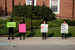 Students of color protest outside of the Union Building Saturday morning. Students of color silently protested at a  family weekend event on Saturday morning. SAM CARAVANA /THE DEPAUW