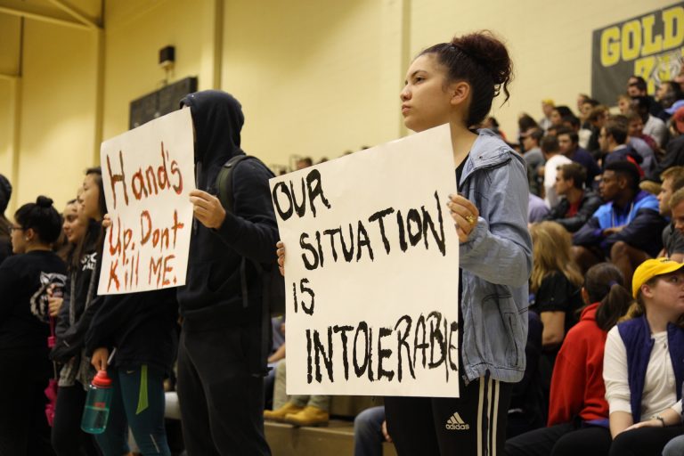 Demonstration at day of dialogue interrupts keynote speaker