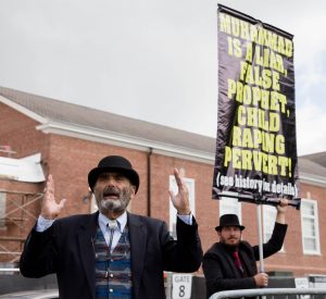 Jeb Smock and his assoicates returned to campus Wednesday.  The group was heckled by some students while many ignored the protest. SAM CARAVANA / THE DEPAUW