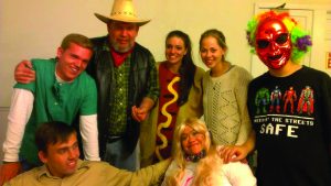 Students and their buddies dress up for a Halloween party. PHOTO COURTESY OF CARA CALLAHAN