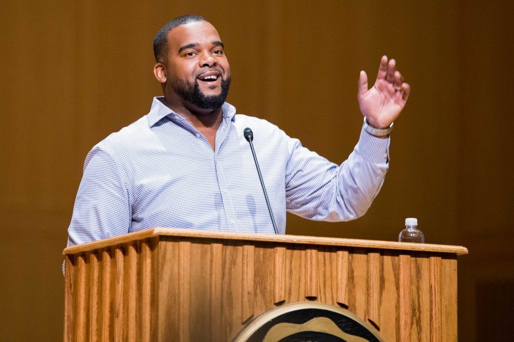 Charles Kuykendoll '09 speaks to freshman on Sunday night as  part of GOLD Alumni Speaker Series. Kuykendoll works for JPMorgan Chase & Co and is vice president of Suit Dreams, a nonprofit organization that gives suits to high school graduates of color in Chicago and New York.