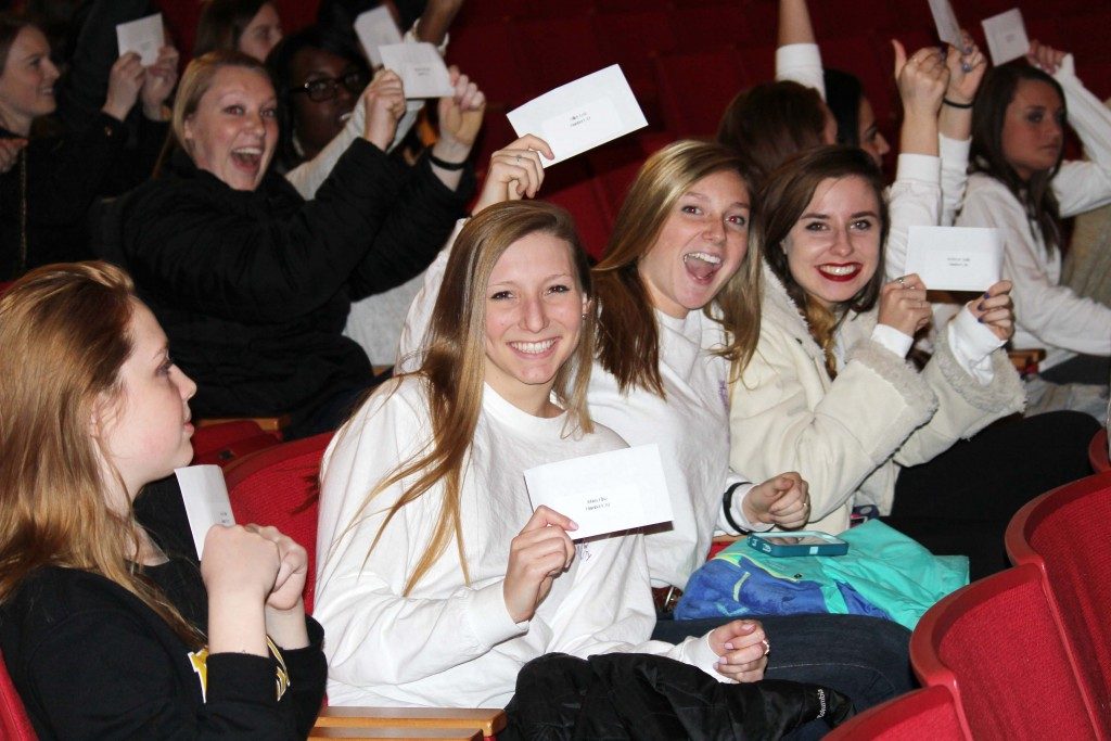 Girls prepare to open their bid cards during sorority recruitment in 2015. ZACH TAYLOR / THE DEPAUW