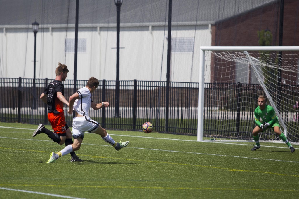 Senior Forward Julian Gonzalez hustles to score for the Tigers. GERALD PINEDA / THE DEPAUW