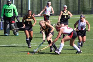 Senior defender, Annie Wyman, fights for possession. DAVID KOBE / THE DEPAUW