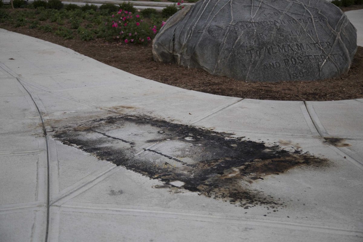A burnt mark is left on the sidewalk after this weekend outside of East College, next to the boulder. GERALD PINEDA / THE DEPAUW