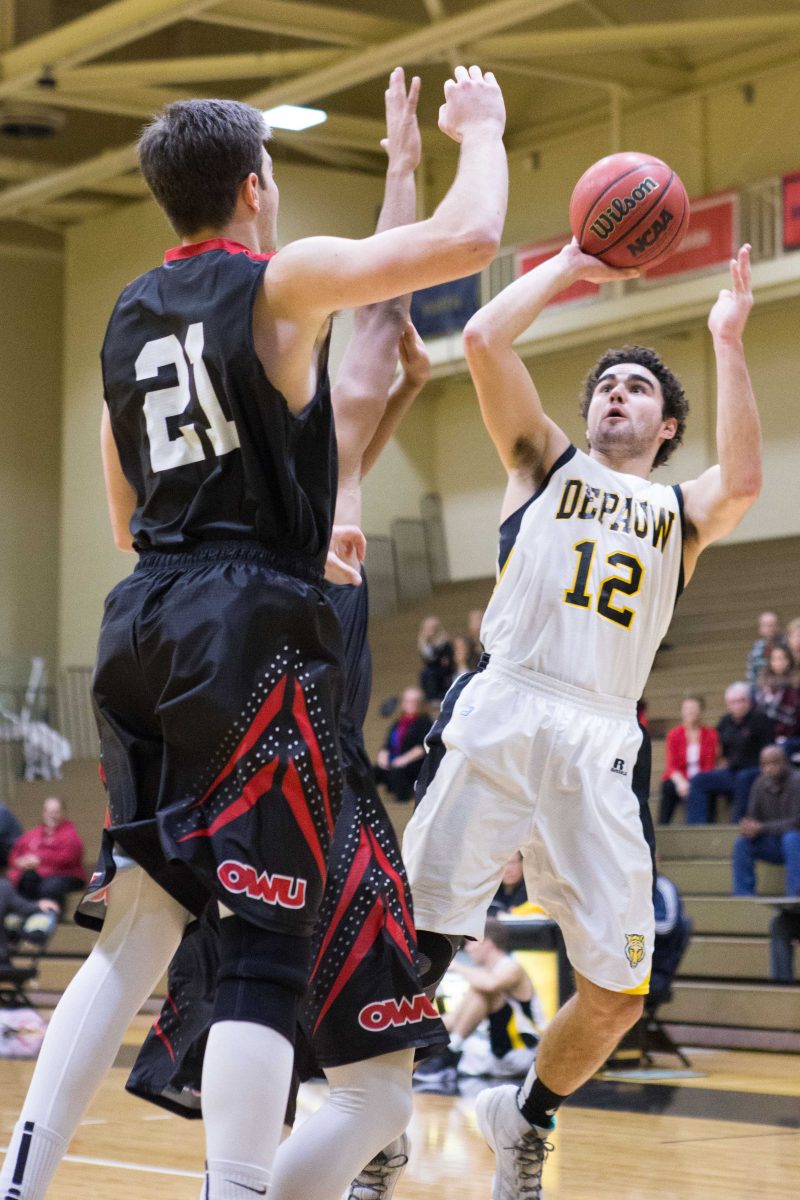 Junior James Clarke scores a layup in the Tigers 71-84 loss to Ohio Wesleyan on Saturday. DePauw’s record sits at 2-4 headed into their next match Wednesday against Wittenberg. SAM CARAVANA / THE DEPAUW