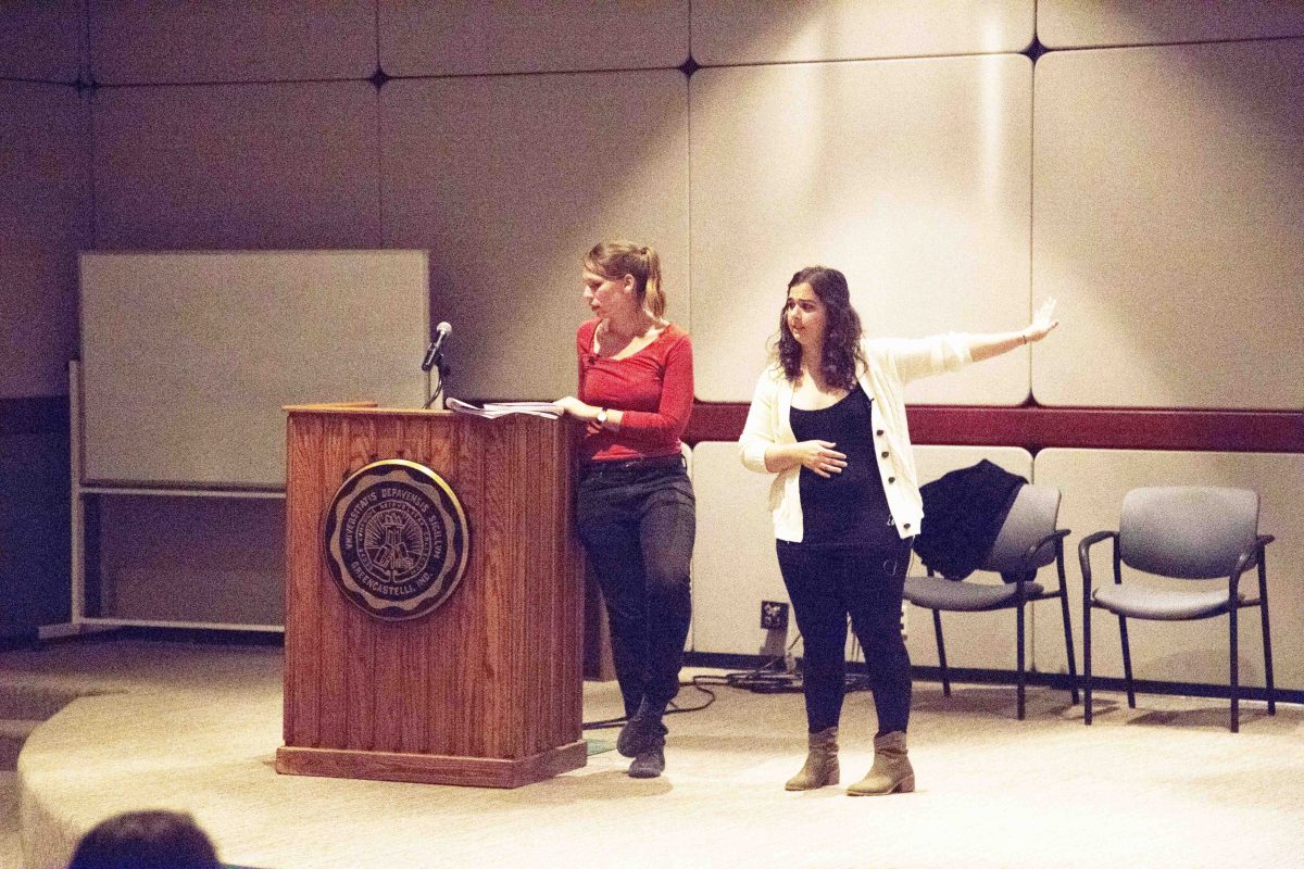 Sophie Smith (left) and Alicia Dinsmoore (right) give a presentation on state sanctioned disappearances along the Mexico-United States border. EMMANUEL KWAKYE / THE DEPAUW