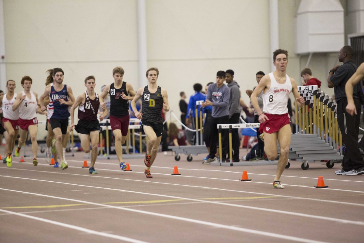 Sophomore Zach Batt chases Wabash runner Dominic Patacsil in the Men’s one mile race. EMMANUEL KWAKYE / THE DEPAUW
