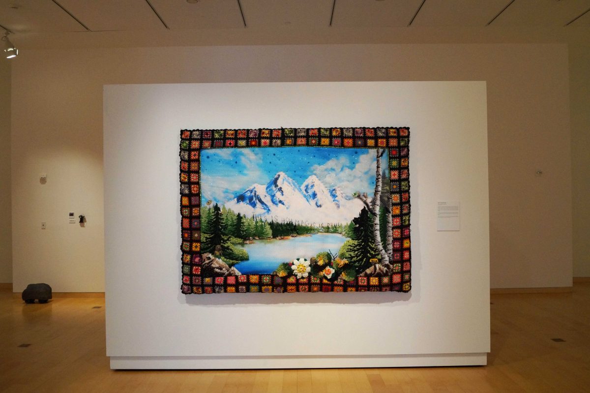 Jeila Gueramian's latch hook rug titled "This Is How Magic Is Done" catches the viewers eye immediately with its bright colors and serene mountain landscape. CAROLINE KNIGHT / THE DEPAUW