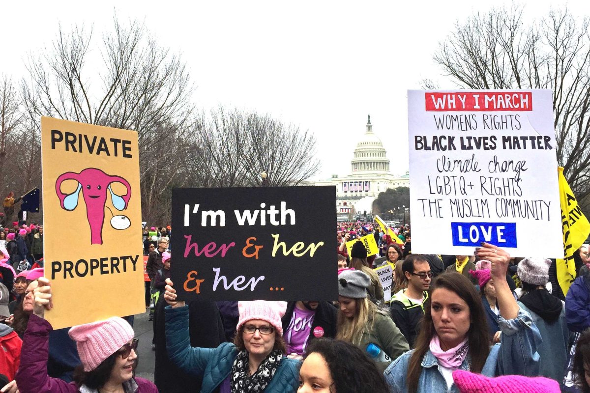 March participants and Senior Cara Callahan rallied in front of the capital for the Women's March on Washington. LEXY BURTON / THE DEPAUW