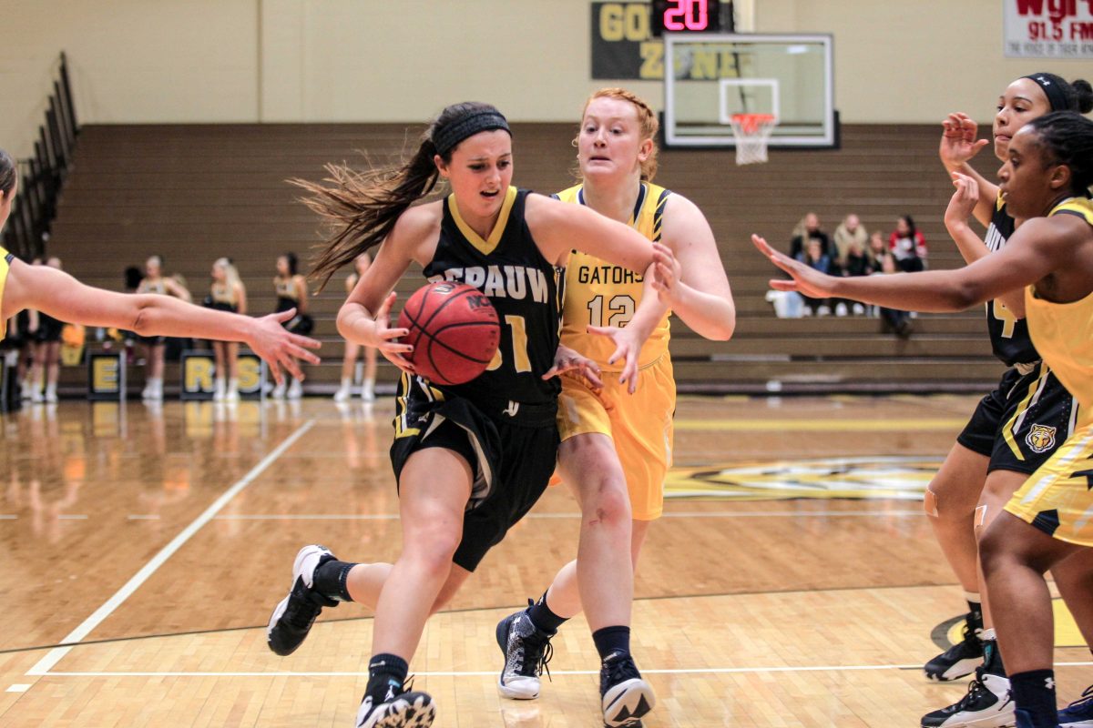 Freshmen Paige Littrell takes the ball in for a layup. REBECA BAGDOCIMO / THE DEPAUW
