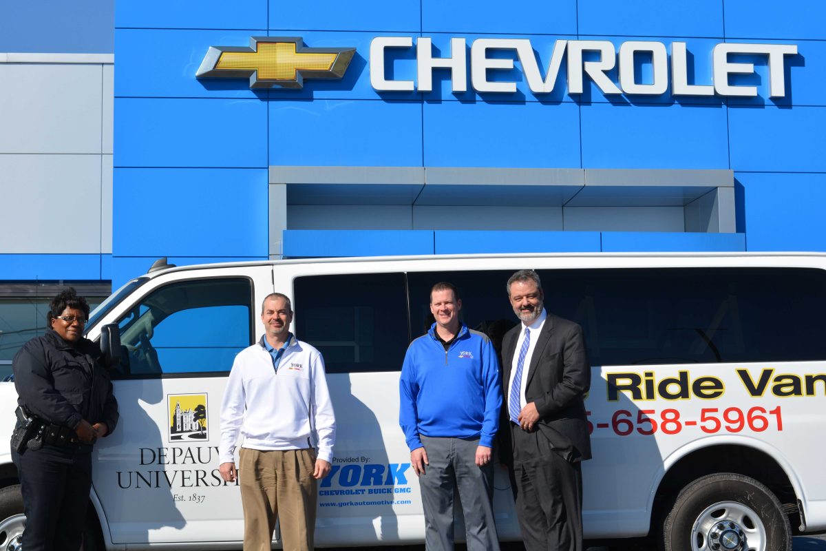 Charlene Shrewsbury, assistant director of DePauw Public Safety and coordinator of the Safe Ride program; Rob York, Nick York, and DePauw President Mark McCoy / Claire Ladd 