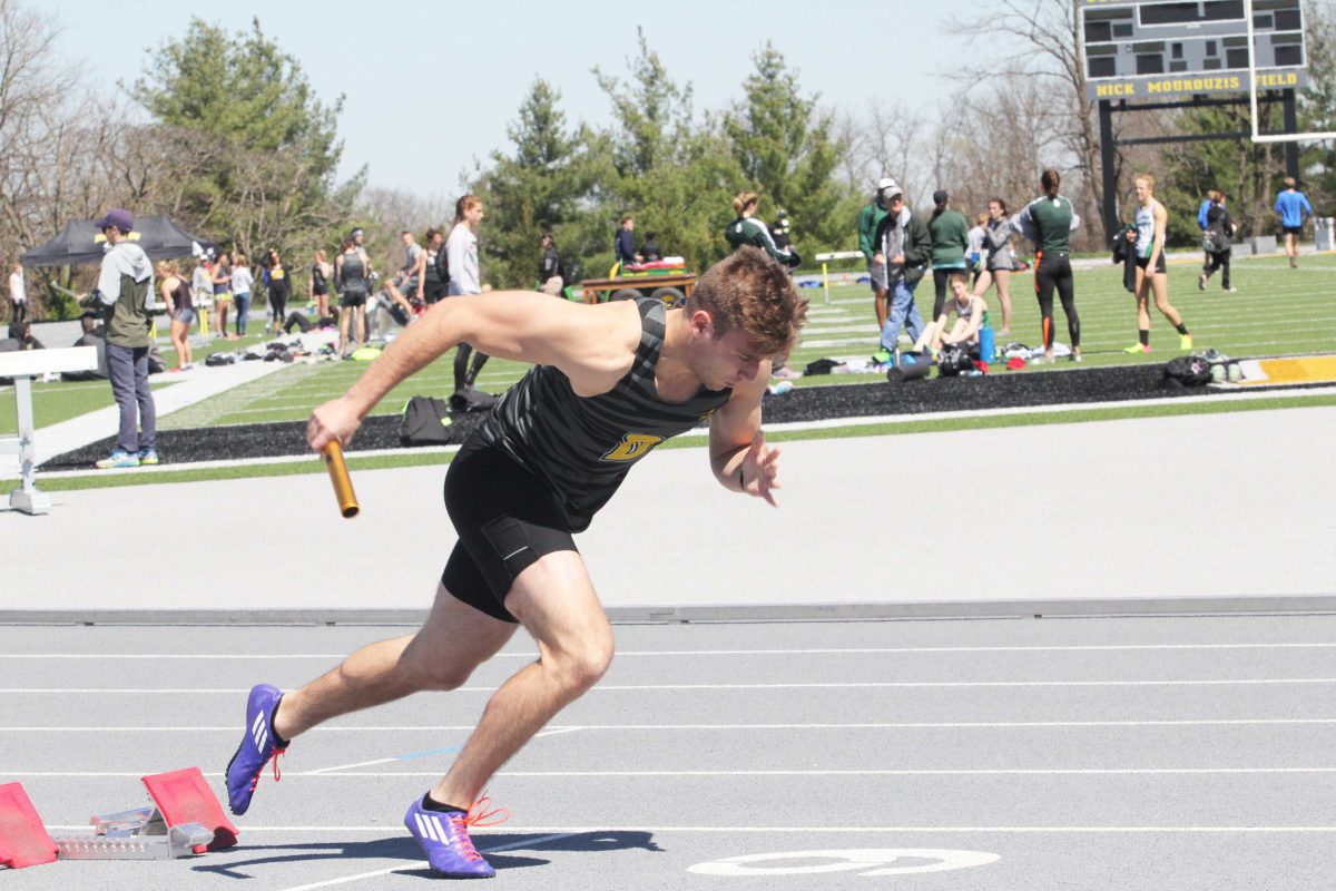 Sophomore Chase Wright prepares to take off in the men’s 4x100 meter relay. EMMANUEL KWAKYE / THE DEPAUW