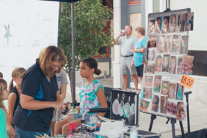 Greencastle Music Festival participants get their faces painted