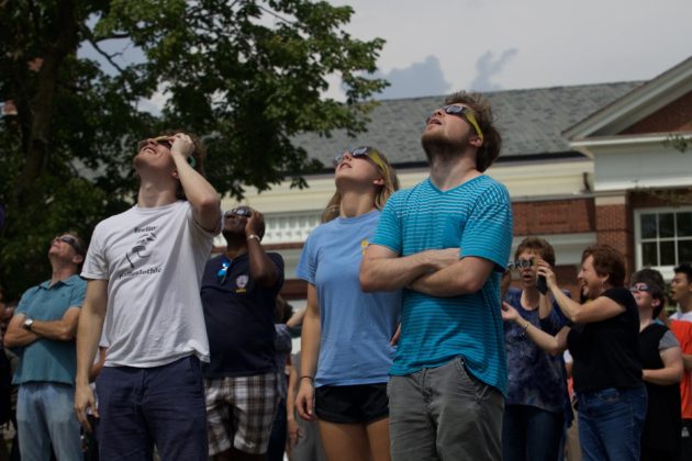DePauw students use glasses to watch solar eclipse