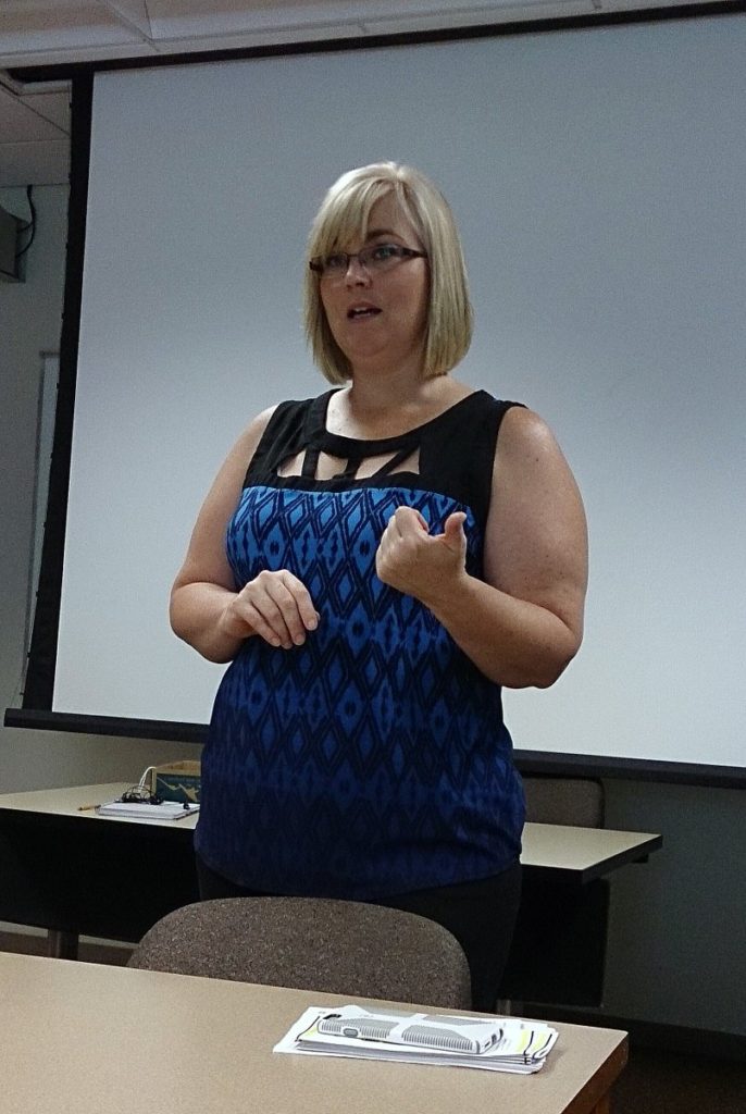 Angie Nally, the former Director of Public Safety, speaking to ITAP students at DePauw University.