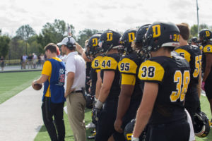 Players watch from the sideline BYRON MASON II