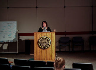 Sara Quinn, the President of the Society for News Design, giving a speech in Watson Forum on photography for journalismNATALIE BRUNINI