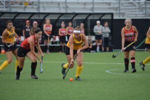 Senior forward Paige Berliner tries to get past a Wittenberg opponent during DePauw's 3-0 loss on Sunday at Reavis Stadium BILL WAGNER