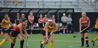 Senior forward Paige Berliner tries to get past a Wittenberg opponent during DePauw's 3-0 loss on Sunday at Reavis Stadium BILL WAGNER