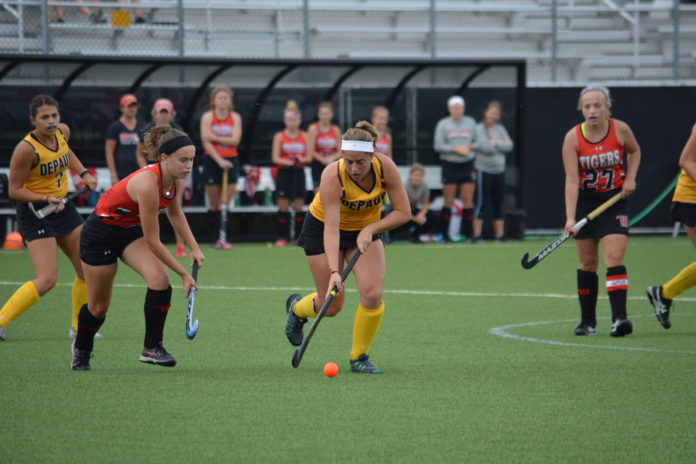 Senior forward Paige Berliner tries to get past a Wittenberg opponent during DePauw's 3-0 loss on Sunday at Reavis Stadium BILL WAGNER