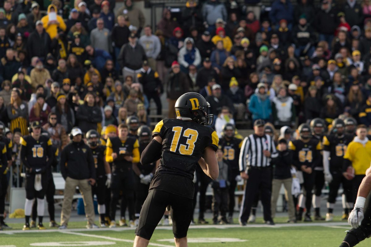 Backup QB  senior Nolan Ayres looks to make a throw downfield BYRON MASON II | THE DEPAUW