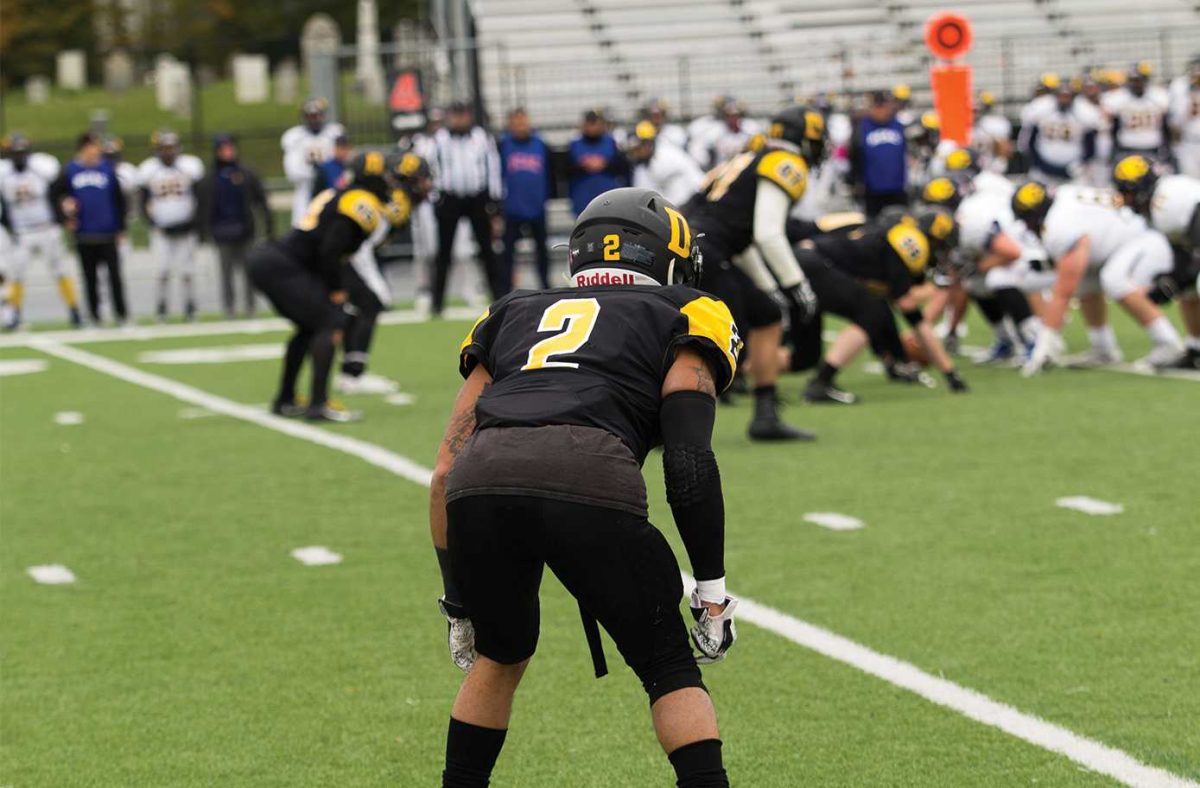 Senior defensive back Ryan Price matches up with an Allegany wide receiver-BYRON MASON II \\ THE DEPAUW