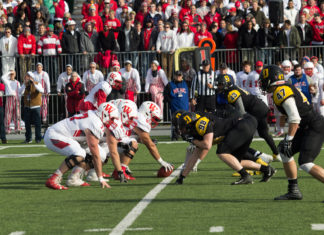 DePauw's defensive line matches up with Wabash's offensive line BYRON MASON II