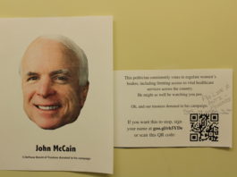 Signs about DePauw Board of Trustees donations to campaigns in the Women's Bathroom in the GCPA _ EMMA MAZUREK THE DEPAUW