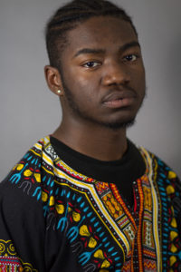 Sophomore Chris Neal models in an elaborate dashikiBYRON MASON II