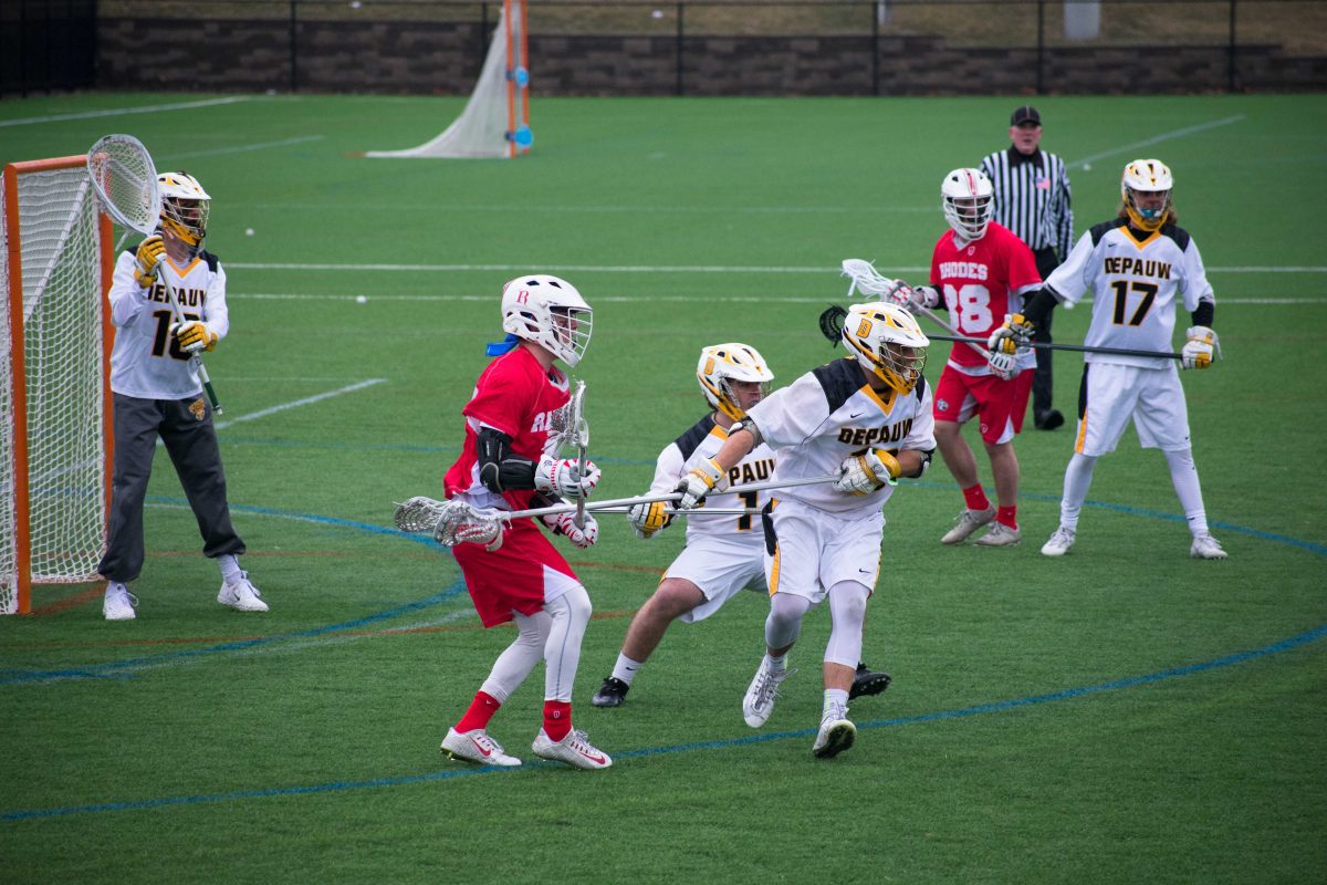 Even after scoring two goals in the final quarter of regulation, the Tigers still came up short as Rhodes scored an additional five goals. NATASHA DRIVER