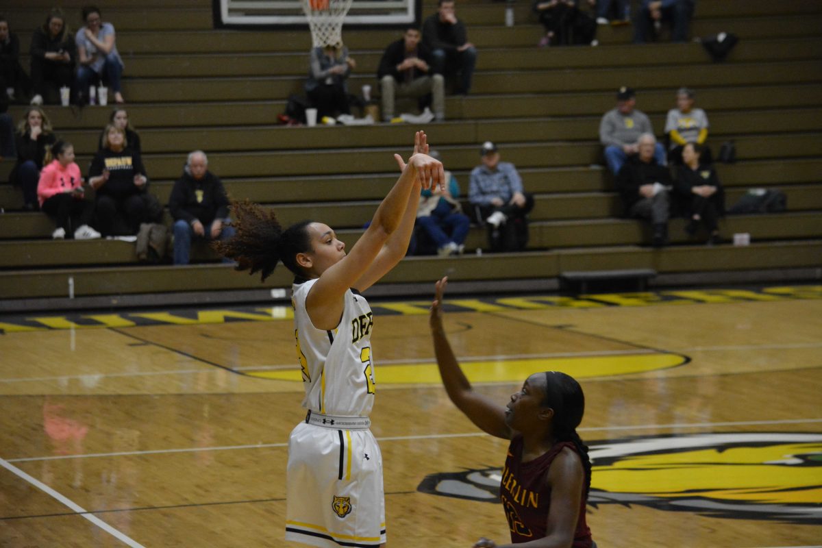 Jr. G Maya Howard takes a shot from beyond the arc. LOUIS BUBALA