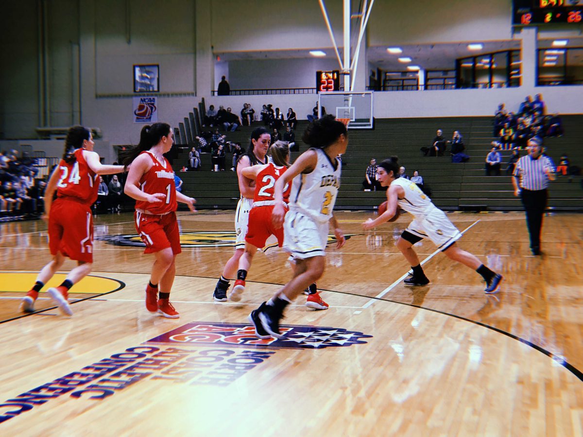 Sydney Kopp (So.) attacks the Wittenberg defenseAUSTIN CANALES