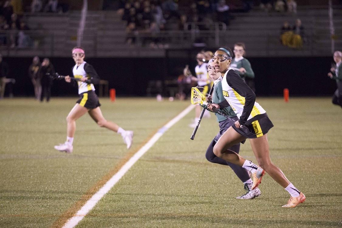 Junior Marisa Ellison defends as Illinois Wesleyan launches a counterattack. EMMANUEL KWAKYE / THE DEPAUW