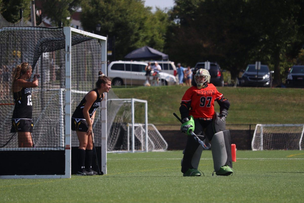 First-year Allison Quakenbush and defenders stand in the goal. (Photo by Nico Forwood)
