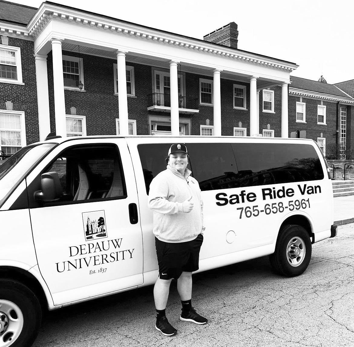 DePauw Student Government President James O'Keane standing in front of the Safe Ride van. Photo provided by depauw_studentgov Instagram Account.