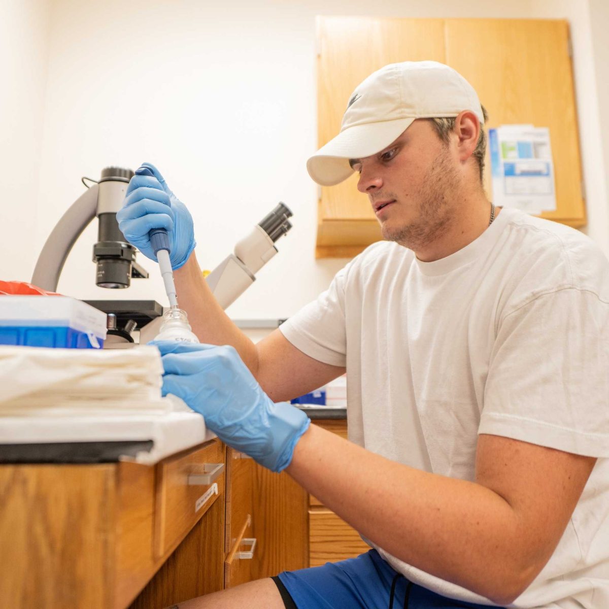 Ryan Miller (class of 2025), works in the research lab.