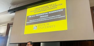 Dr. Javier Juárez-Pérez, assistant professor of political science, presents a primer for international students on Sept. 11 at the Union Building ballroom to promote awareness on U.S. election processes.