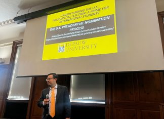 Dr. Javier Juárez-Pérez, assistant professor of political science, presents a primer for international students on Sept. 11 at the Union Building ballroom to promote awareness on U.S. election processes.