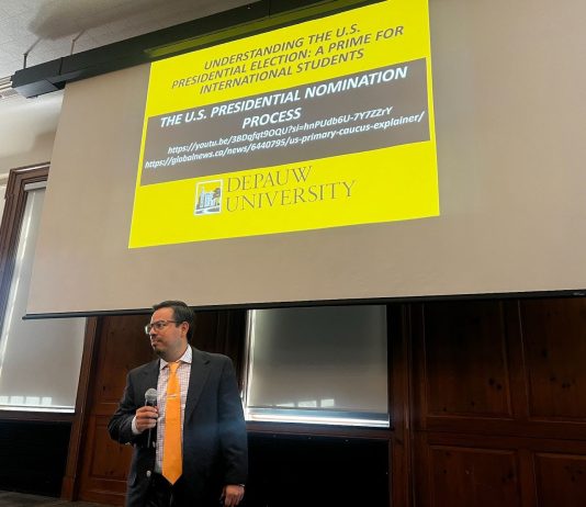 Dr. Javier Juárez-Pérez, assistant professor of political science, presents a primer for international students on Sept. 11 at the Union Building ballroom to promote awareness on U.S. election processes.