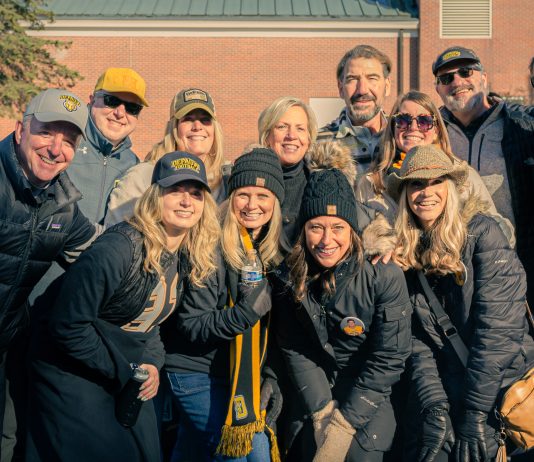 The DePauw community gathers together during a tailgating event for the 2023 Monon Bell game between DePauw and Wabash College. (Photo courtesy of Ha Chu '26)