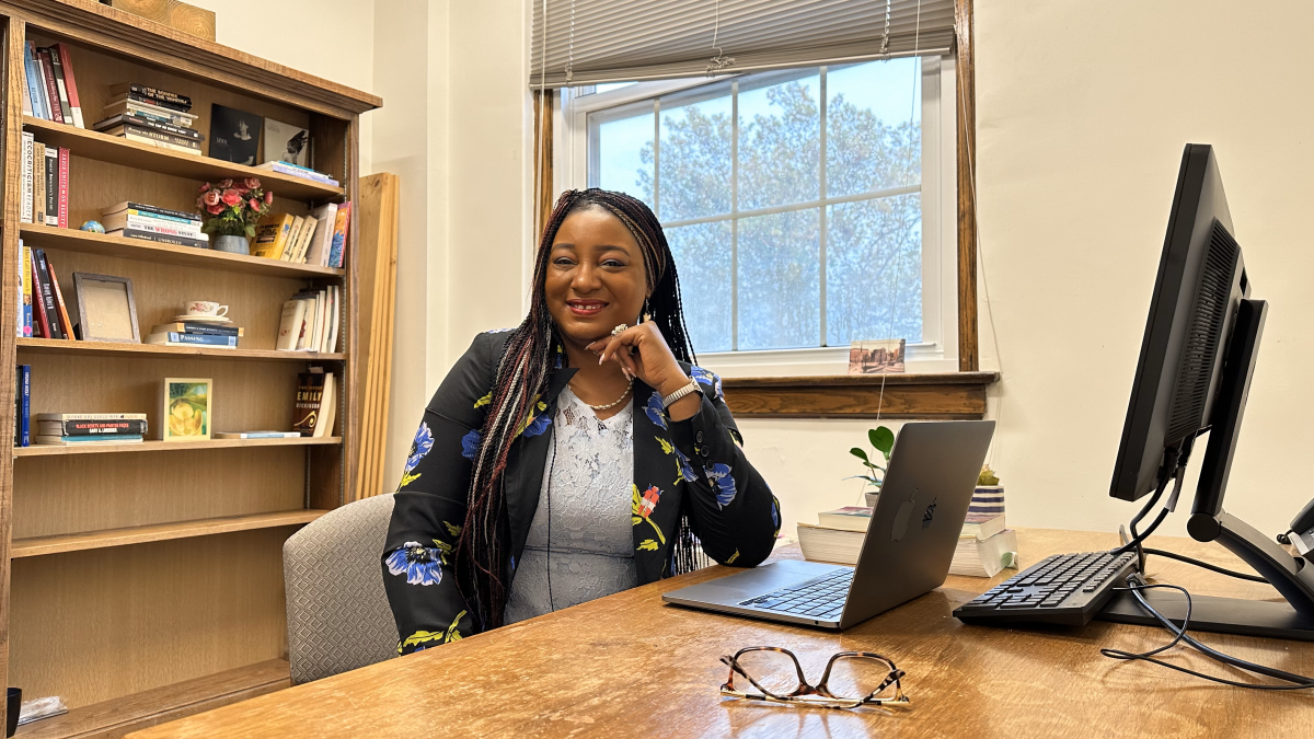 Dr. Jennifer Mike sits in her office as DePauw's newest Visiting Global Studies Scholar. Photo credit: Ahnaf Labib '26
